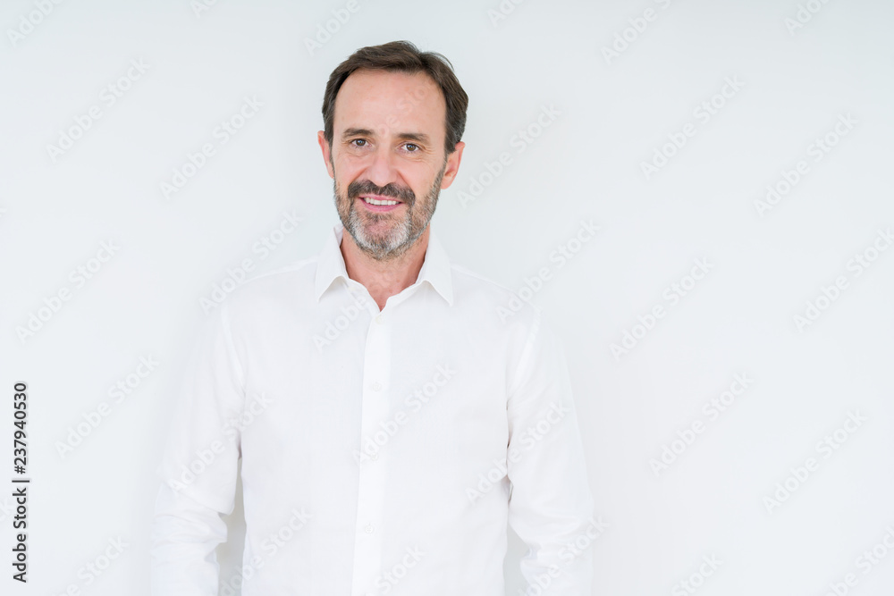 Elegant senior man over isolated background with a happy and cool smile on face. Lucky person. Elegant senior man over isolated background with a happy and cool smile on face. Lucky person.