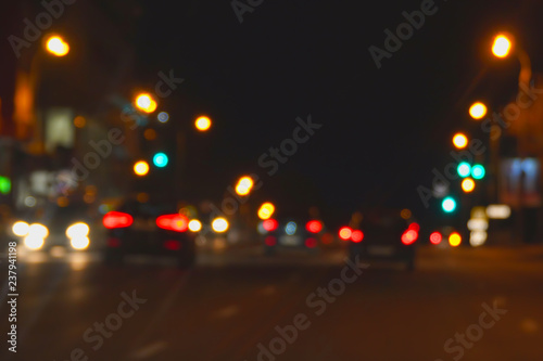 Defocused image of night traffic in the city