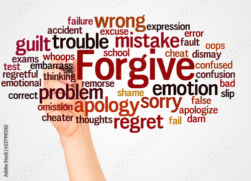 Forgive word cloud and hand with marker concept photo