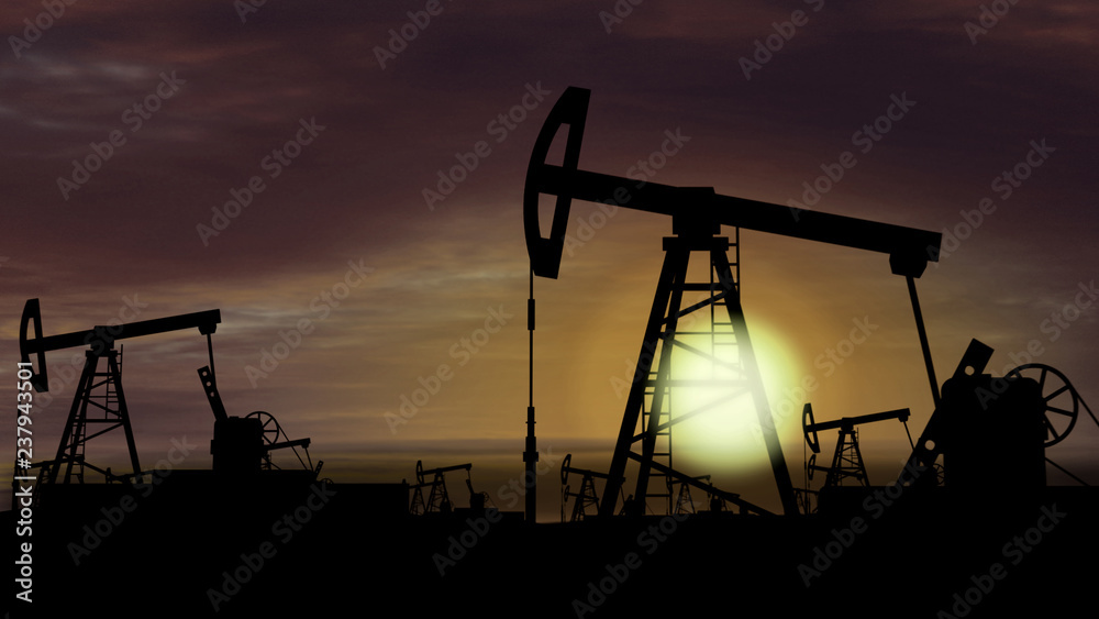 Oil pumps - oil extraction on sunset background