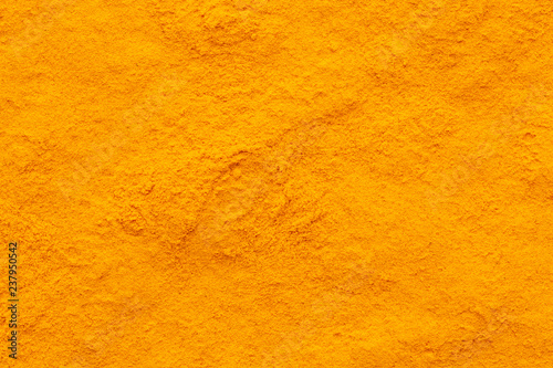 curcuma turmeric spice powder full frame rough surface