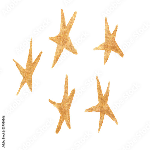 Set of five simple decorative stars painted with golden acrylic on white isolated background