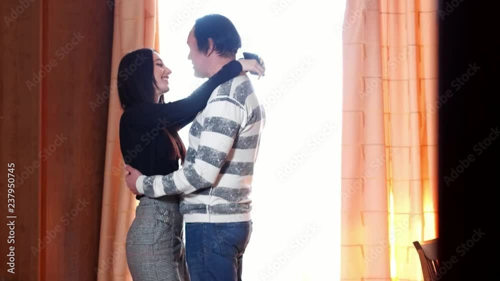 A love story between an Asian man and a European woman, an Asian guy with long black hair, a European with long black hair, a slim girl, plump guy, family life, home comfort, weekdays of young couple A love story between an Asian man and a European woman, an Asian guy with long black hair, a European with long black hair, a slim girl, plump guy, family life, home comfort, weekdays of young couple