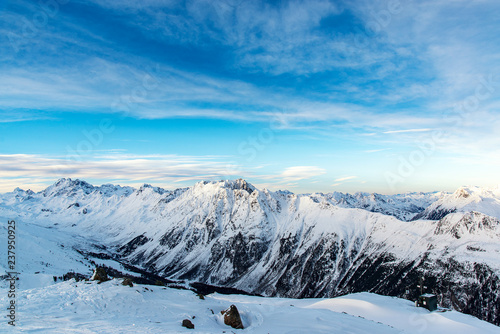 View of the Alpine mountains in the morning in the ski resort of Ischgl, Austria. © Ms VectorPlus