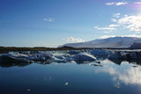Jokulsarlon with blue sky, ice rocks and fascinating landscape on Iceland