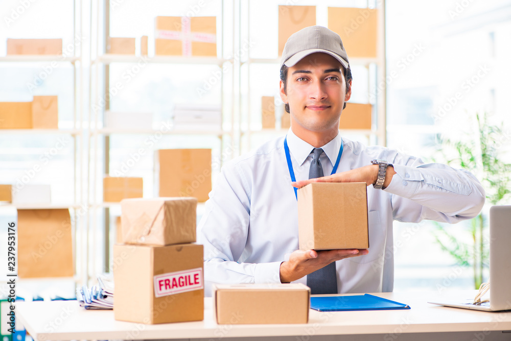 Male employee working in box delivery relocation service Male employee working in box delivery relocation service