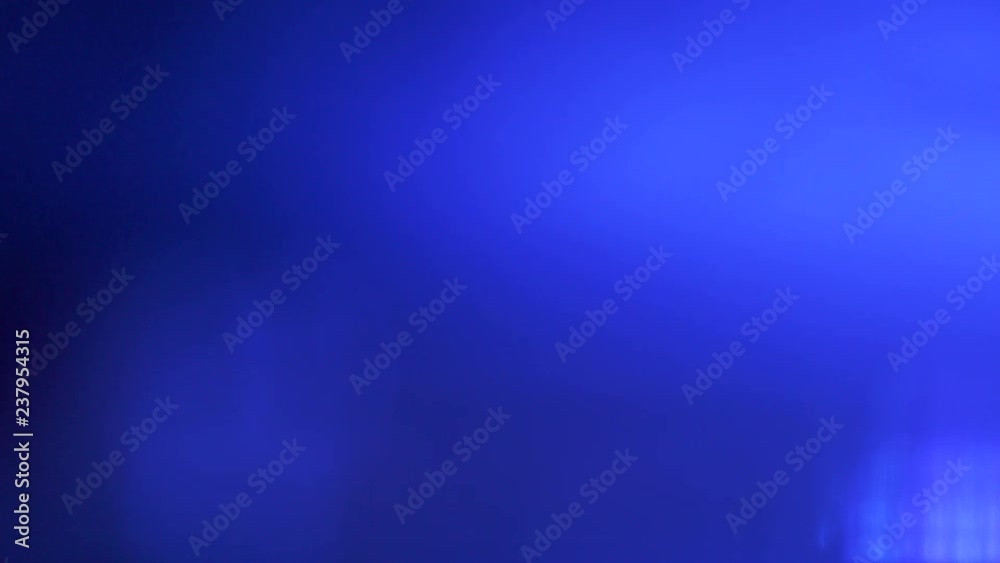 Defocused police red blue emergency lights flashing in the dark Defocused police red blue emergency lights flashing in the dark