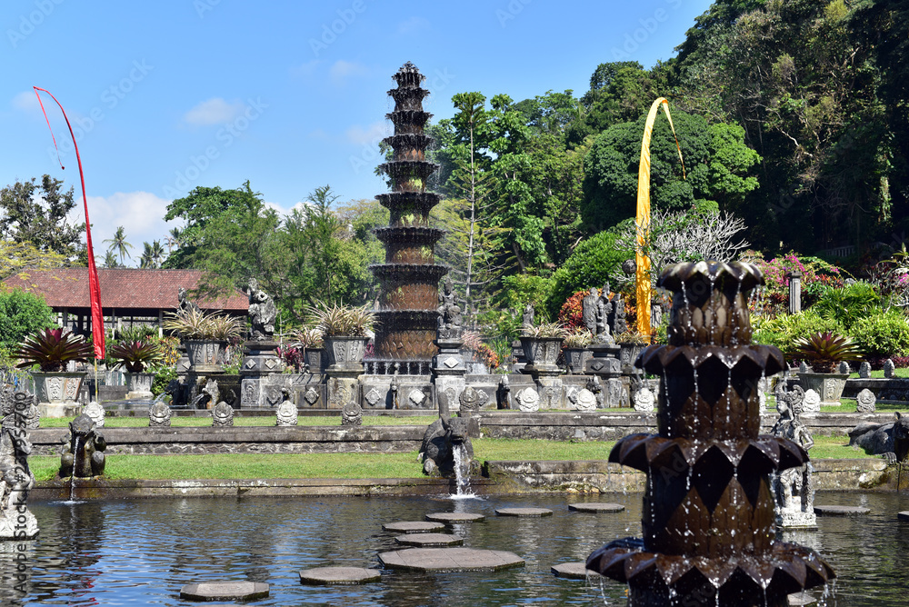 Hindu Balinese Water Palace Tirta Gangga with statues of the gods, fountains on Bali island, Indonesia