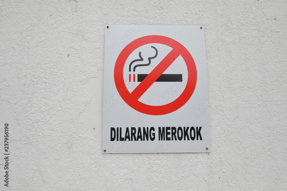 No smoking sign Malaysia. Translation for Malay - No smoking. No smoking sign Malaysia. Translation for Malay - No smoking.