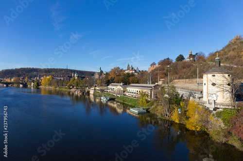 Colorful autumn Prague gothic Castle with the Lesser Town above River Vltava in the sunny Day, Czech Republic © Kajano