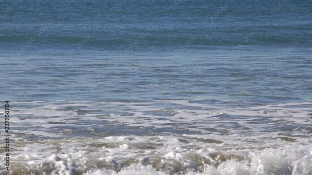 Light Breeze waves at sea Algave Portugal. Light Breeze waves at sea Algave Portugal.