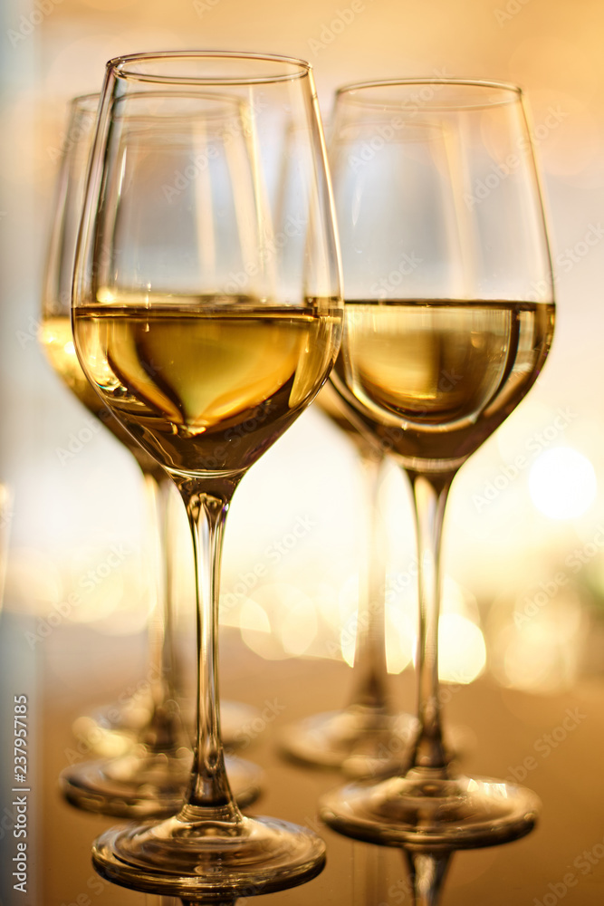 The glasses of white wine