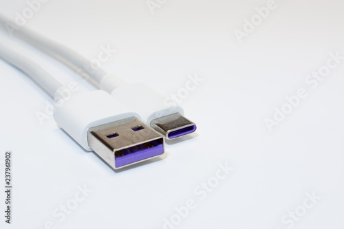 USB type C and USB 3.0 cables on white background