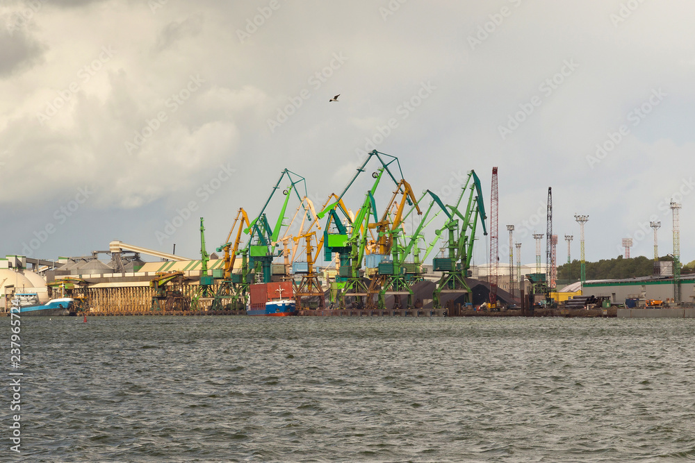 Heavy harbor jib cranes in the Klaipeda Sea Port, Lithuania.