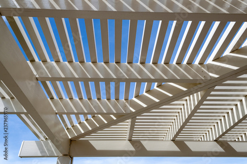 White pergola and blue sky