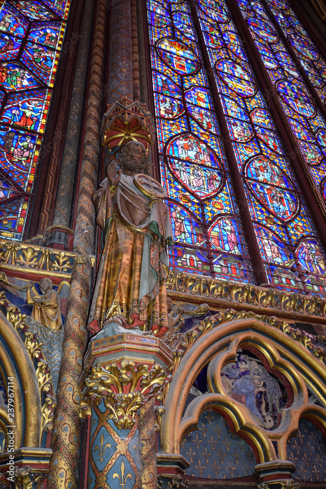 Interior and stained glass windows of the magnificent gothic chapel of Sainte Chappelle in Paris