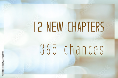 12 new chapters 365 chances, new year positive quotation on blur abstract bokeh background, banner photo