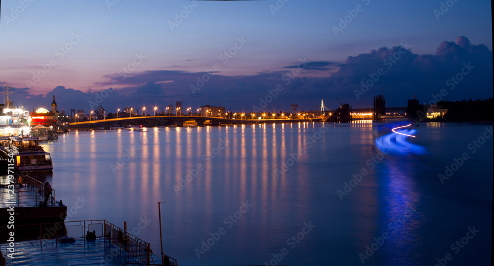 Dnipro quay on sunset background and wark colors