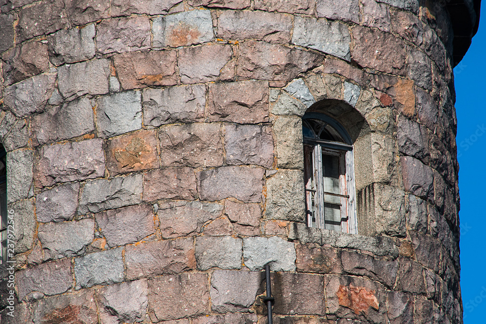 Ancient stone tower with a window
