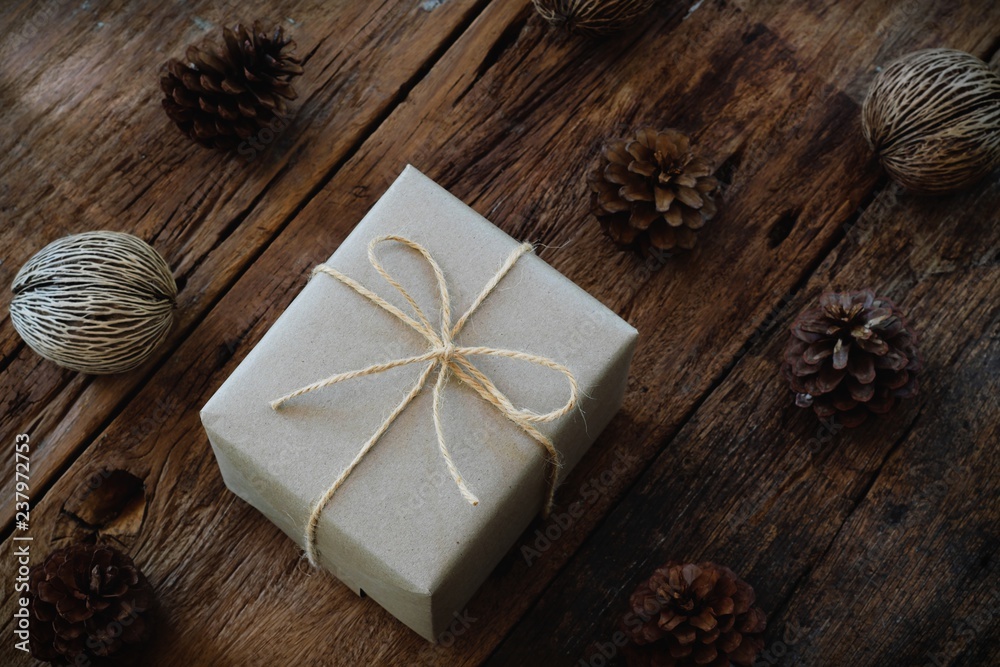 Eco friendly gift boxes wrapped with brown paper, green happy new year present concept Eco friendly gift boxes wrapped with brown paper, green happy new year present concept
