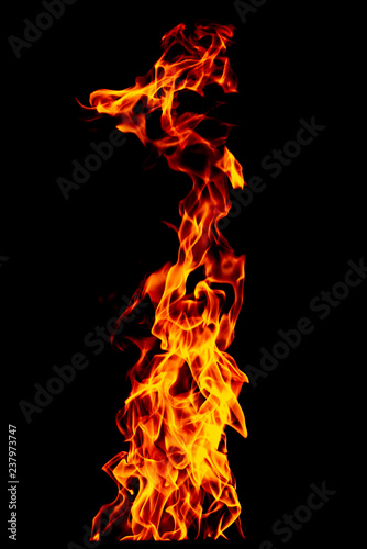 Fire flame isolated on black isolated background - Beautiful yellow, orange and red and red blaze fire flame texture style.