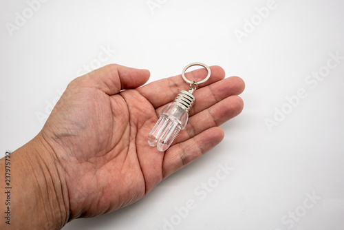LED flashlight mini bulb with U shape keychain isolate on white