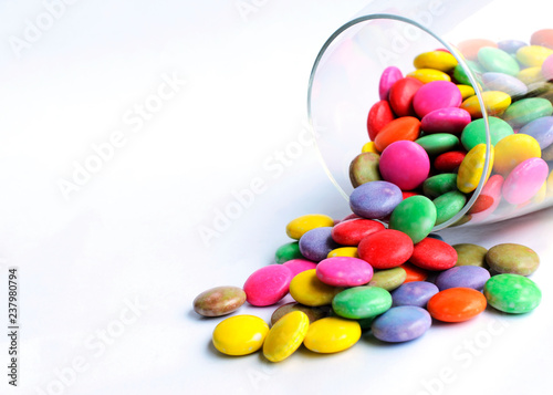 macro close up of colorful chocolate coated candy Isolated on white backgrounds