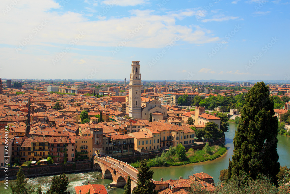 Obraz premium Aerial view of old city Verona with orange rooftops and high towers in sunny day. , Italy