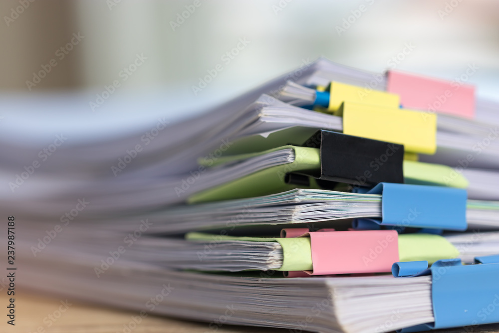 Close up stack of paperwork. Pile of unfinished homework assignment ...