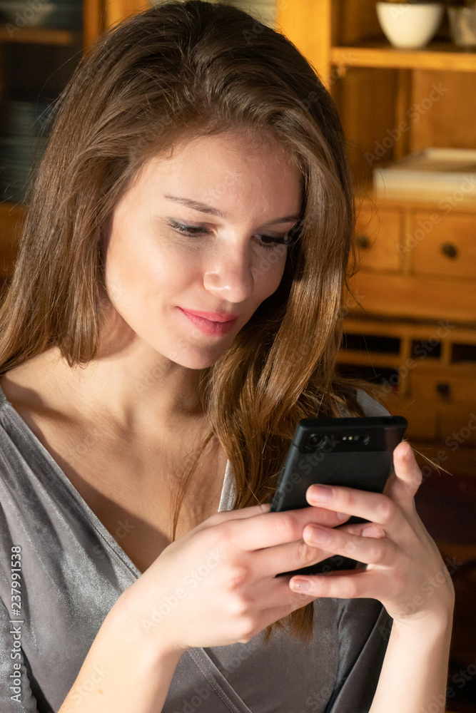 Woman using smartphone or taking selfies Woman using smartphone or taking selfies