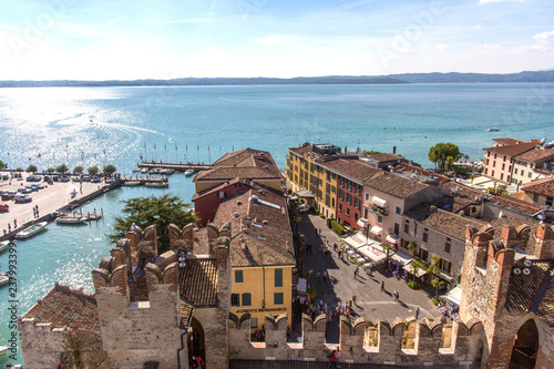 castle in sirmione top view. View from the top of the castle walls of Scaliger Castle inside Lake Garda. Sirmione, Italy. Nature and history. The lake on the horizon line.