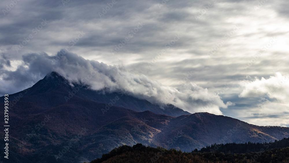 Clouds on a mountain range landscape