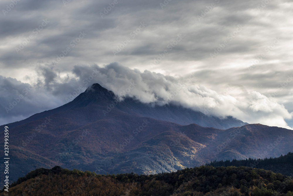Cloudscape on a mountain landscape