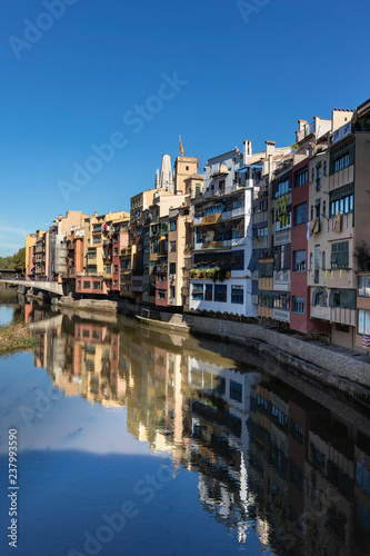 Girona famous landmark river facade houses with water reflection © jordieasy