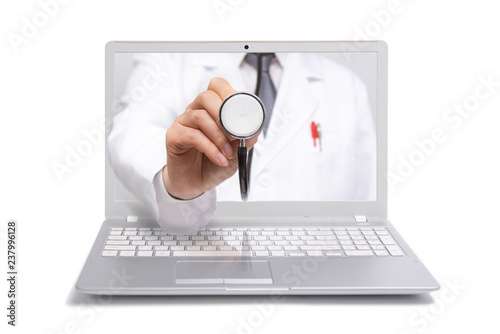 Telemedicine concept. Doctor with a stethoscope on the computer laptop screen. photo