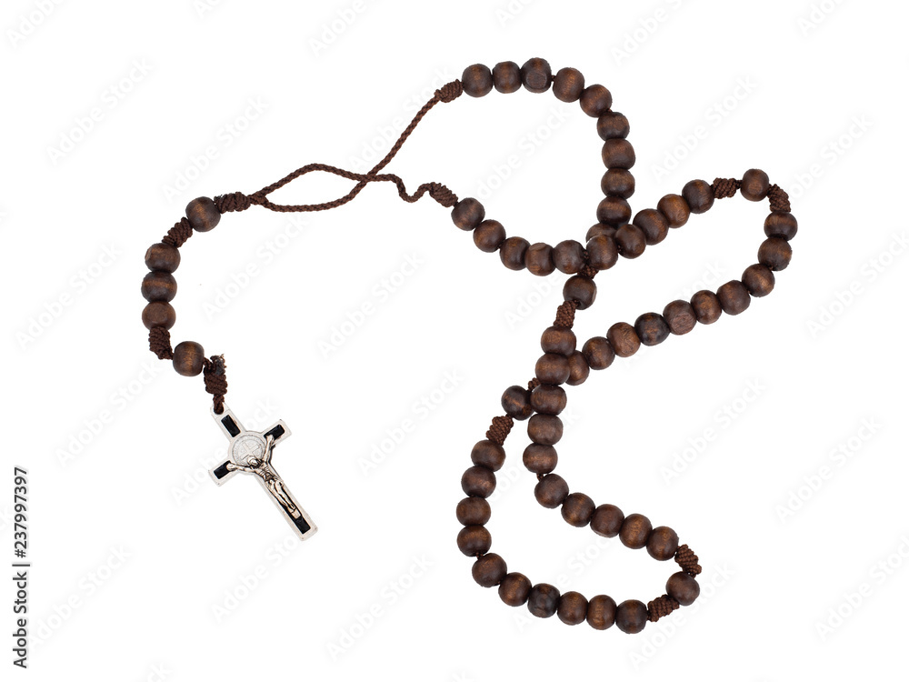 Rosary isolated on white background. Christian cross, crucifix, wooden beads. Rosary isolated on white background. Christian cross, crucifix, wooden beads.