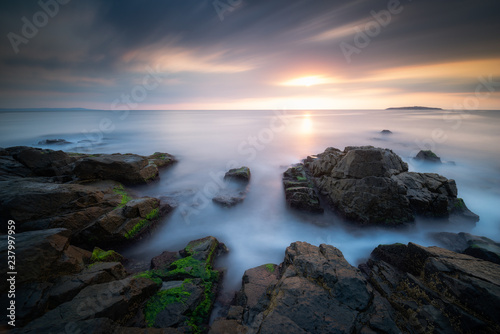 Sea sunrise, near the rocks © Ivan