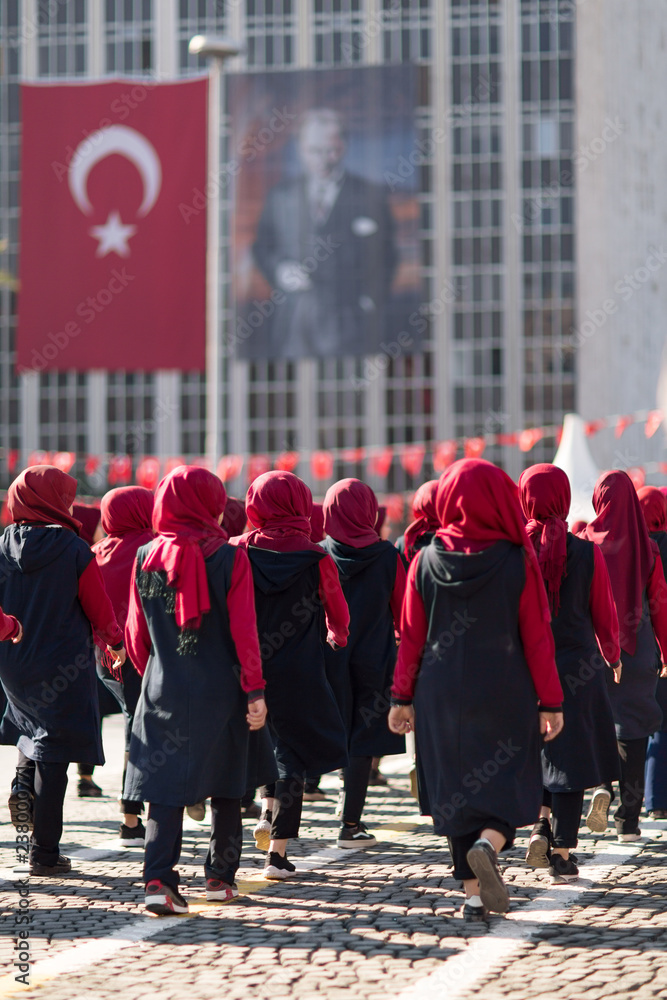Turkish girl students with headscarf are walking in republic ceremony day of Turkey 29 Oct. 2018 Alsancak Izmir Turkey