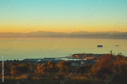 Aerial view of old fishing town Izola. Colorful spring evening on Adriatic Sea. Beautiful seascape of Slovenia, Europe. Beauty of countryside concept background. Artistic style post processed photo.