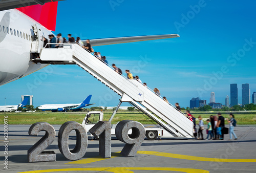 Photography People are boarding from apron, by the stairs