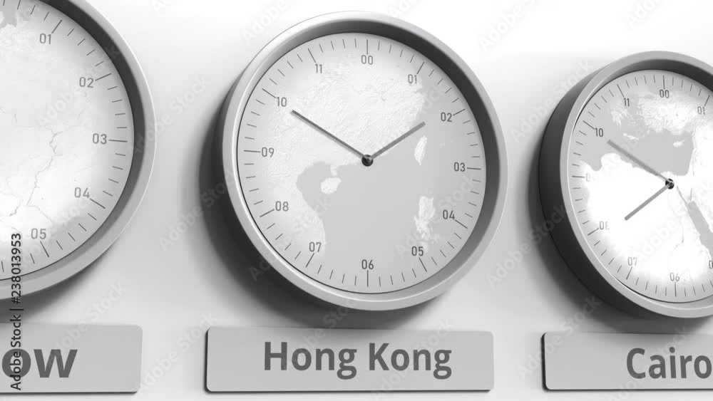 Round clock showing Hong Kong, China time within world time zones