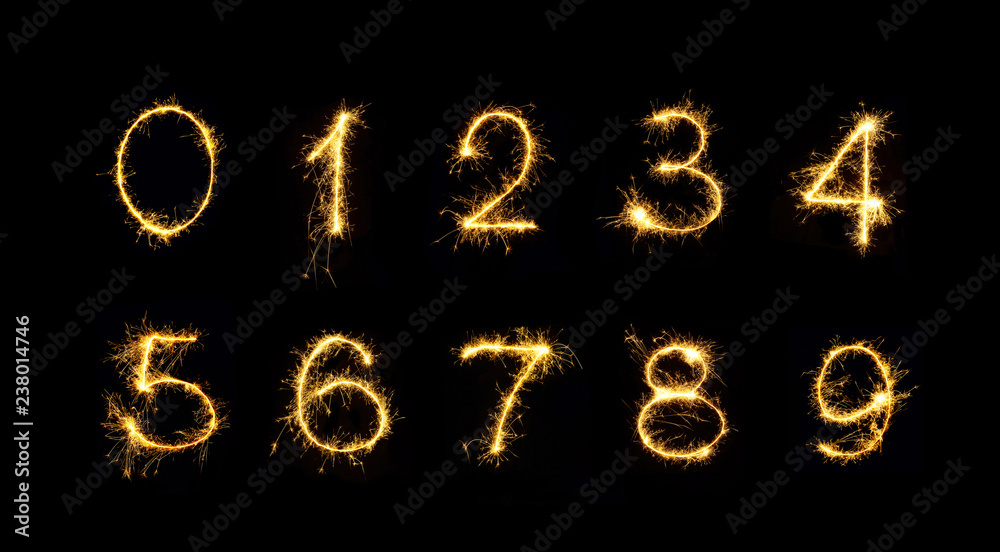 Set of Burning sparkler Numbers isolated on black background Set of Burning sparkler Numbers isolated on black background
