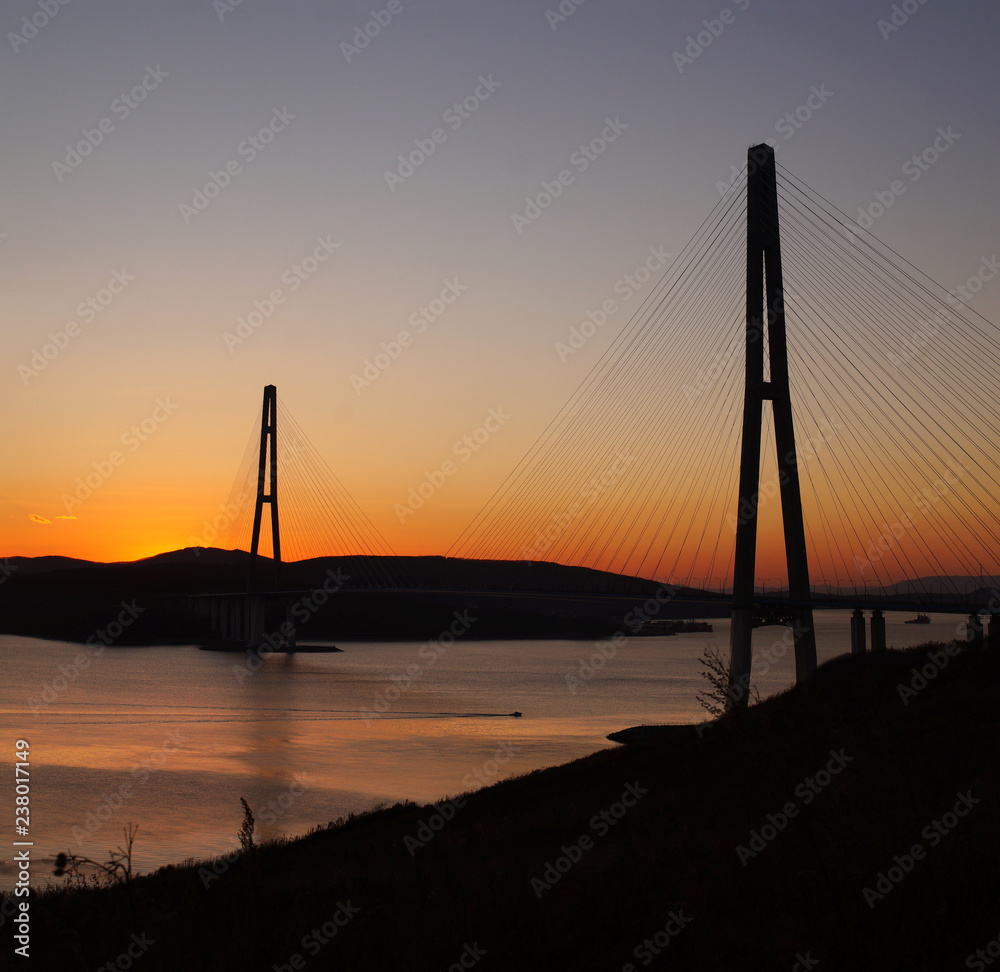 Bridge to the Island Russian city Vladivostok at sunset