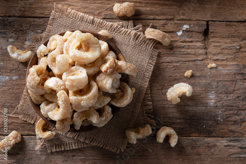 Pork rinds also known as chicharon or chicharrones , kab moo