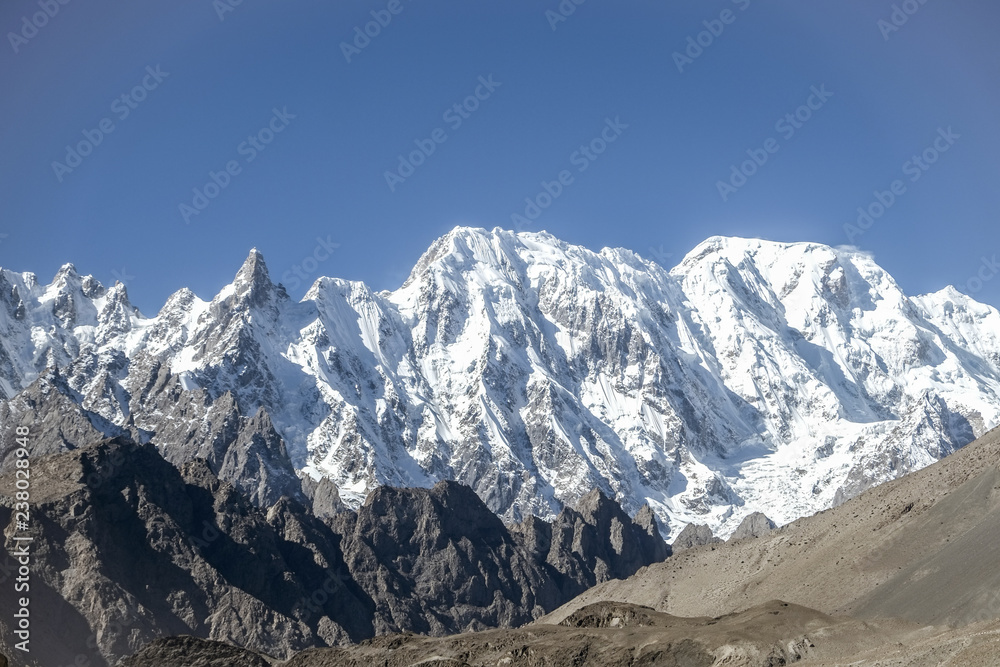 Obraz premium Snow capped mountains in the Karakoram range. Passu, Gilgit Baltistan, Pakistan.