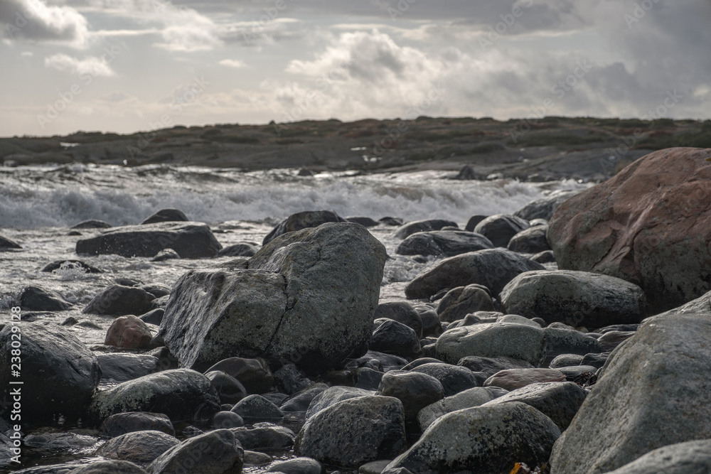 rocks along the sea a cold autumn day