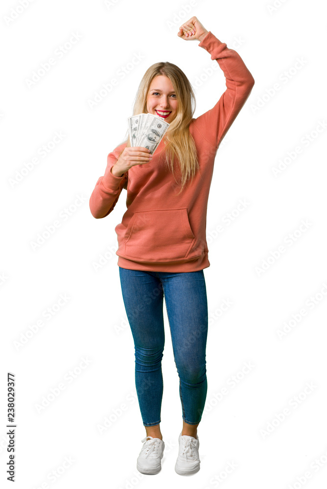 A full-length shot of a Young girl taking a lot of money on isolated white background A full-length shot of a Young girl taking a lot of money on isolated white background