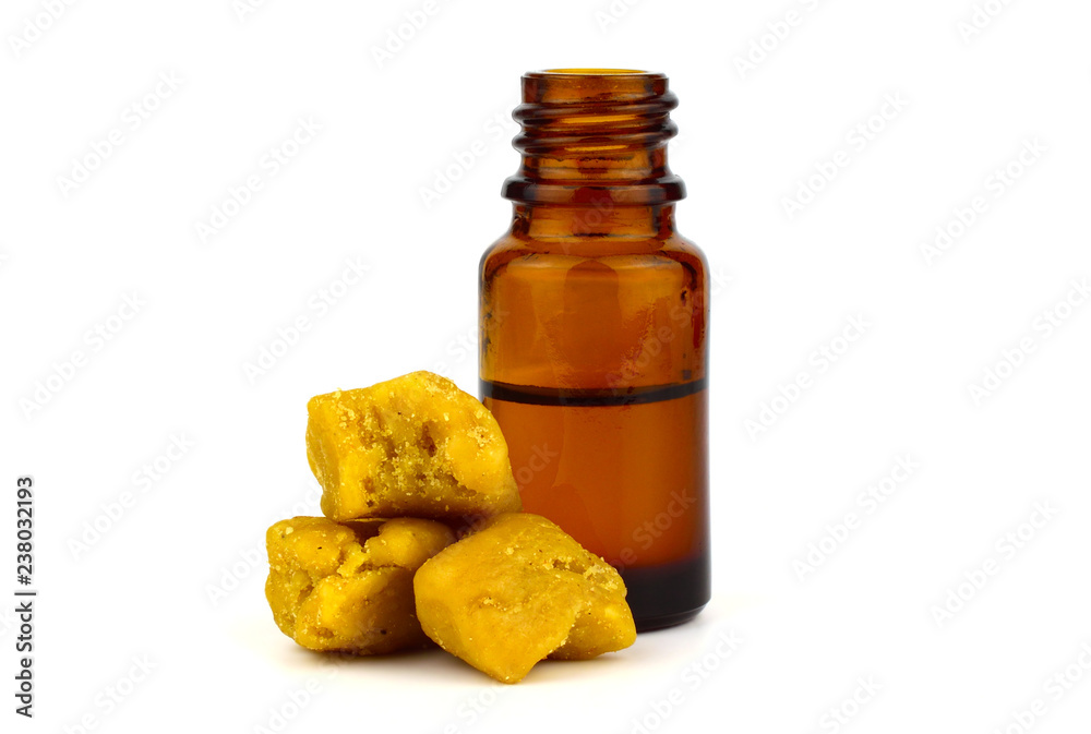 Asafoetida Dried Gum Medicine Tincture in a Bottle, Isolated on White