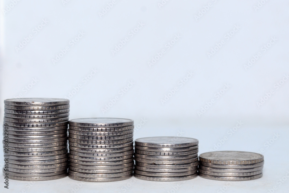 Stock pile 2 two Indian rupee metal coin currency on isolated white background. Financial, economy, investment growth concept. Banking and exchange object. closeup. Stock pile 2 two Indian rupee metal coin currency on isolated white background. Financial, economy, investment growth concept. Banking and exchange object. closeup.