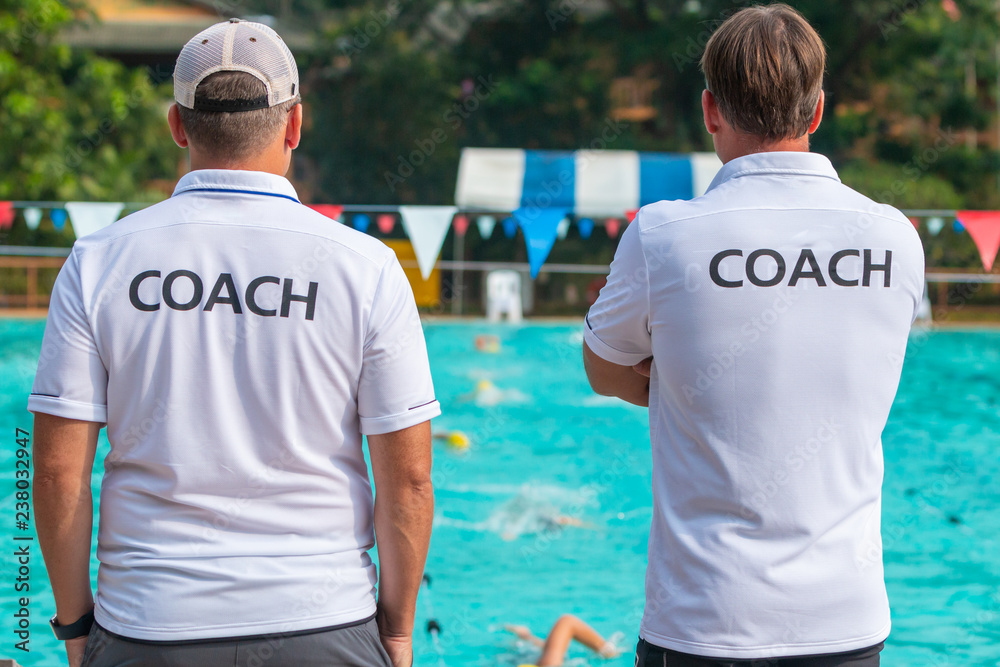 Fototapeta premium Back view of sport coaches